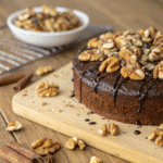 Healthy Date and Walnut Cake with walnuts and chocolate drizzle